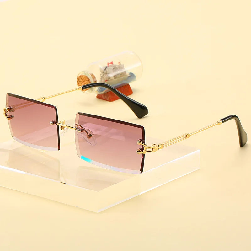 TOYEARN Rectangle Rimless Sunglasses UV400 Diamond Cut Women Fashion Sunglasses SWANS