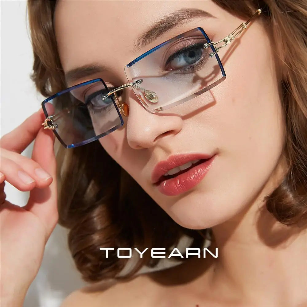 TOYEARN Rectangle Rimless Sunglasses UV400 Diamond Cut Women Fashion Sunglasses SWANS
