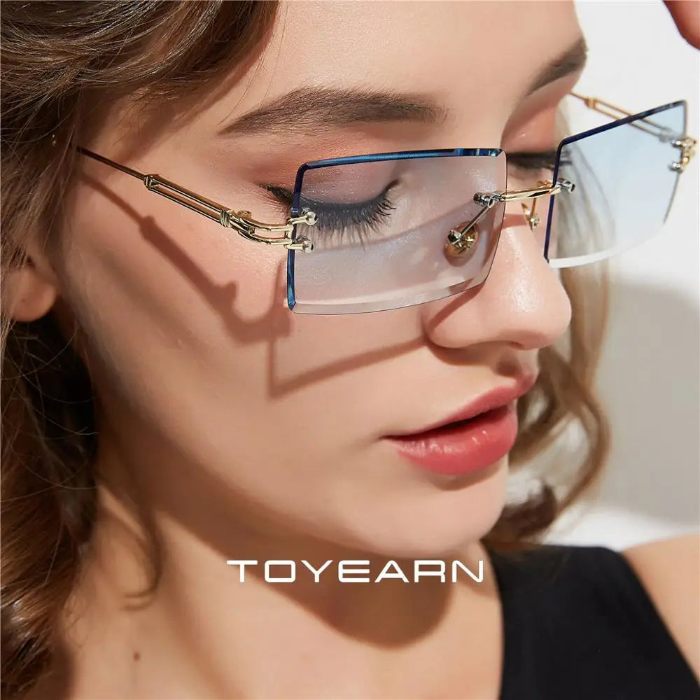 TOYEARN Rectangle Rimless Sunglasses UV400 Diamond Cut Women Fashion Sunglasses SWANS