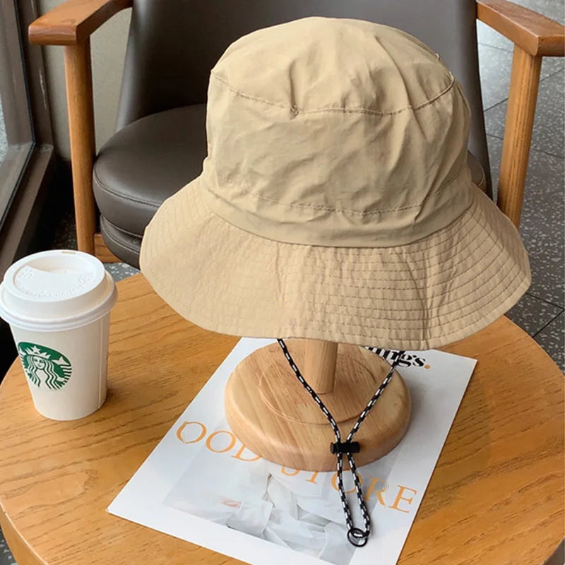 FAITOLAGI Drawstring Bucket Hat – Quick Dry UV Sun Cap Bucket Hat SWANS